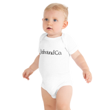 Unbound Co. Baby short sleeve one piece (Wordlogo)