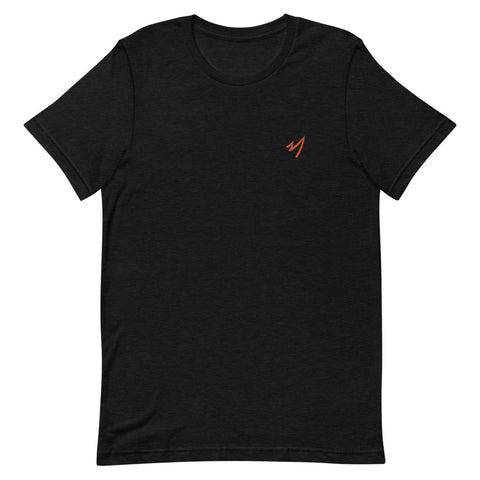 A black Bella Canvas Shirt with a small Wild Rhino Mark embroidered in orange thread on the front upper left chest area.